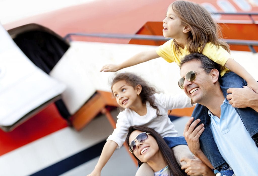Family traveling by airplane

How to Travel Well with Food-Allergic Kids, Escape to Sun