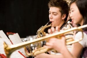 Q: My 15-year-old has asthma and is learning to play the saxophone. If he practices a lot, he has shortness of breath afterward and sometimes the next day. Should he choose a different instrument?