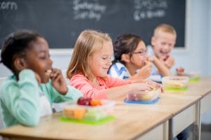 Effectively cleaning allergenic foods off a school desk