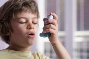 asthma inhaler throat pain
