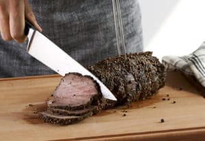 Pepper crusted beef tenderloin, perfect for any festive feast.