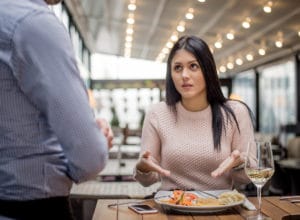 Woman questions restaurant food order