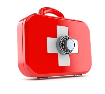 First aid kit with combination lock isolated on white background. Schools and Locked Up Epinephrine: A Dangerous Situation