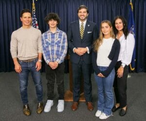 Sen. Andrew Gounardes with Zaremba teens John and Lucia and their parents. 
